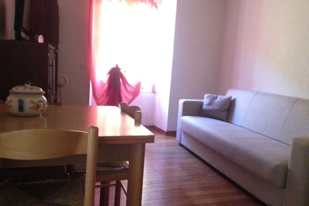 Soggiorno con letto divano