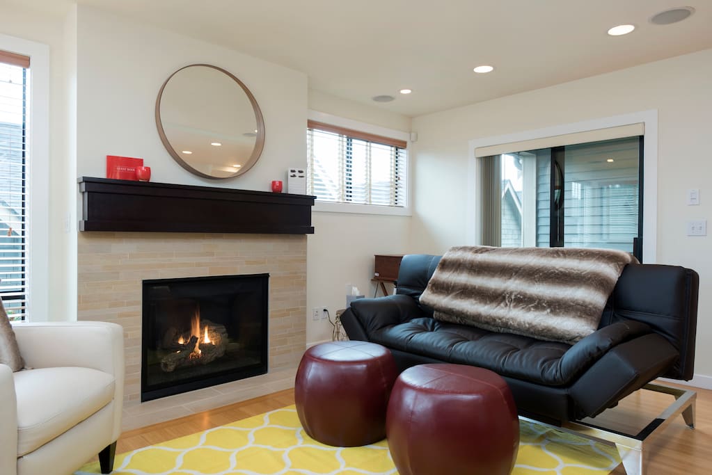 2nd floor living room with sliding doors leading to private deck