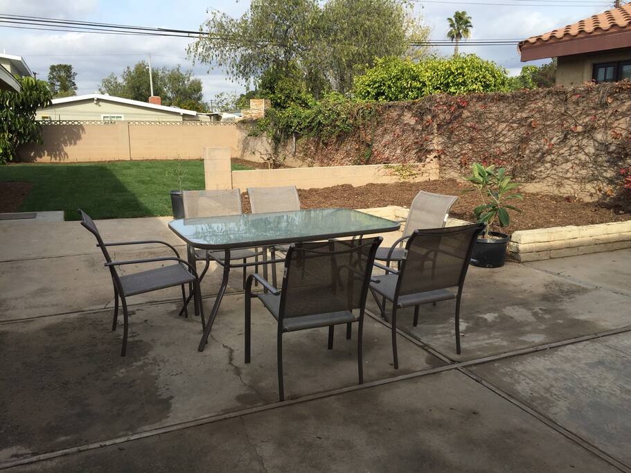 Large furnished patio with webber grill and extensive gardens -fully enclosed and private