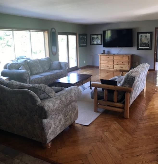 Large Living room with plenty of space for everyone.
