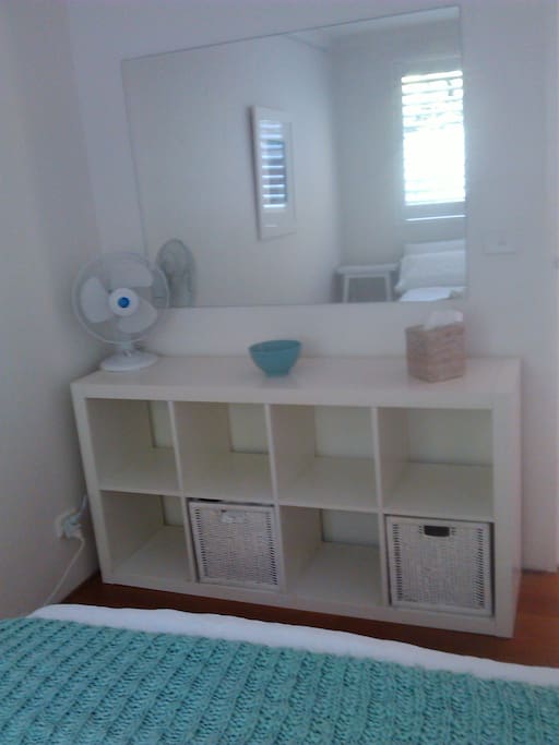 Storage space in bedroom.