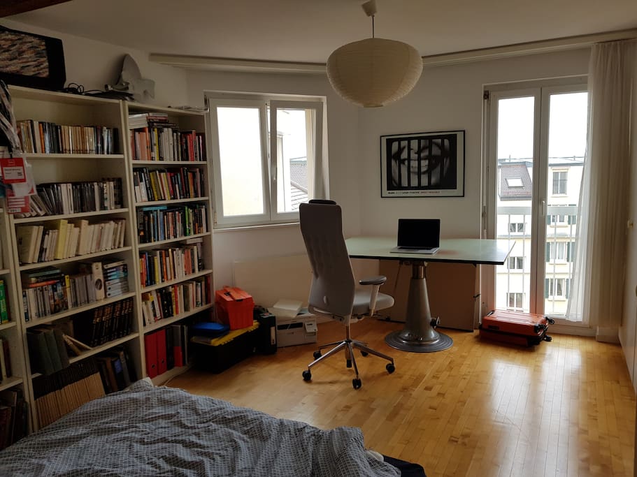 The bedroom has an office corner, ideal for those late-night emails