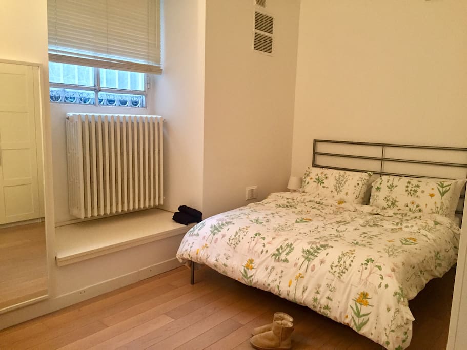 Queen bed with fitted wardrobes