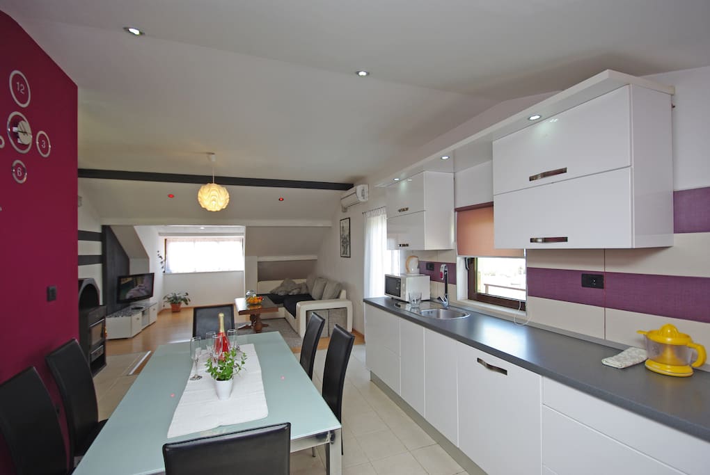 Kitchen with view on living room