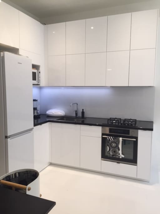 The apartment has a brand new and spacious joint kitchen & living room with all the necessary appliances (coffee maker, microwave, toaster, oven etc).