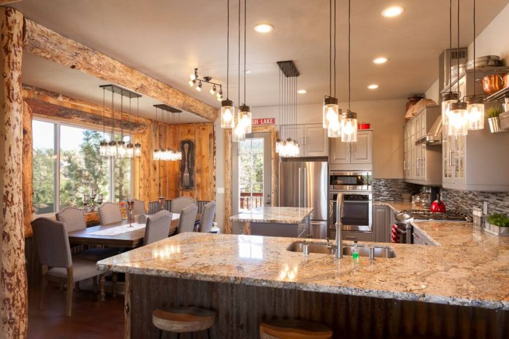 Granite and glass tile kitchen with all cookware and flatware needed for that perfect meal in the mountains.
