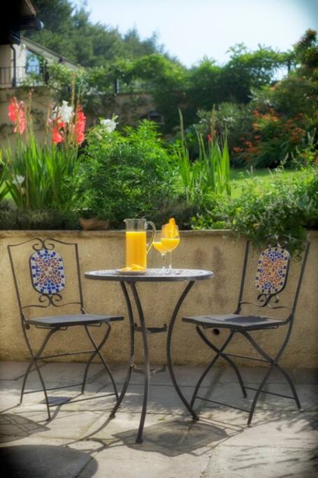 Kitchen patio - 2nd Patio overlooking gardens and accessed by double opening French doors.