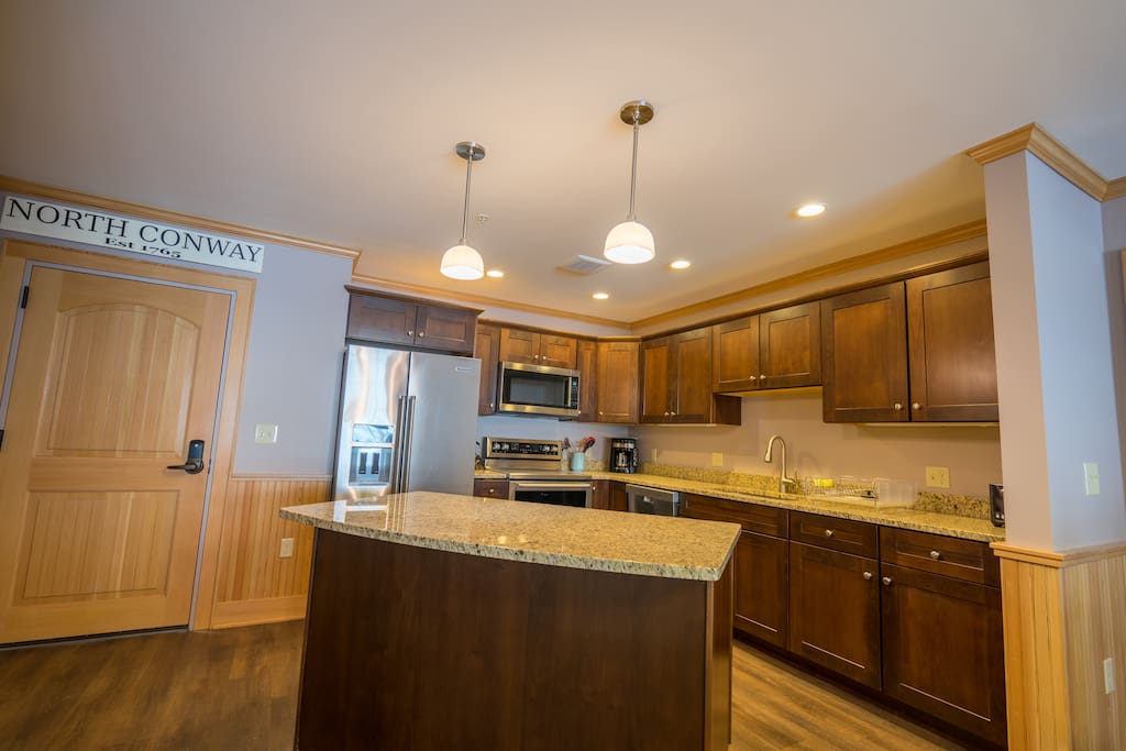 Fully outfitted kitchen has everything you need to dine in, including cutlery, dishes, pots and pans and coffee maker.