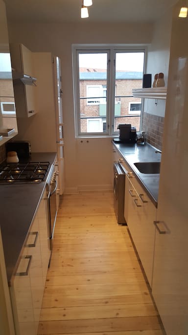 Kitchen is equipped with a Nespresso machine and functioning washer. Help yourself! :)