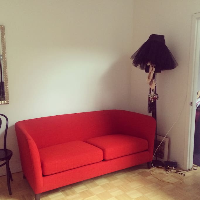 Sofa in the living room and the lamp with my ballet accessories