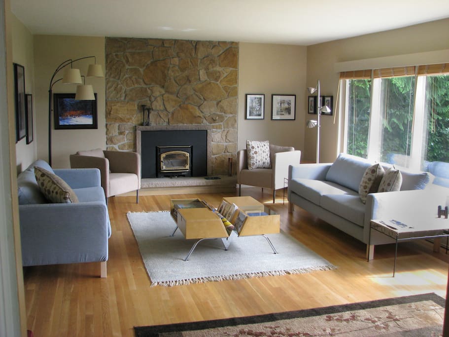 Living room has a cozy fireplace insert