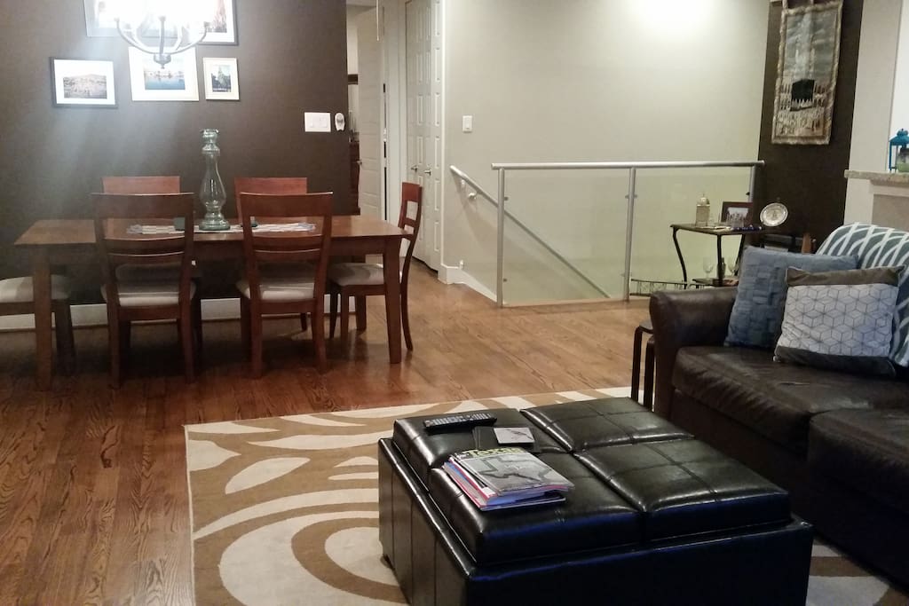Open floor plan with dining room seating for six, plus plenty of space for additional seating. Great view of TV for entertainment and space everywhere.
