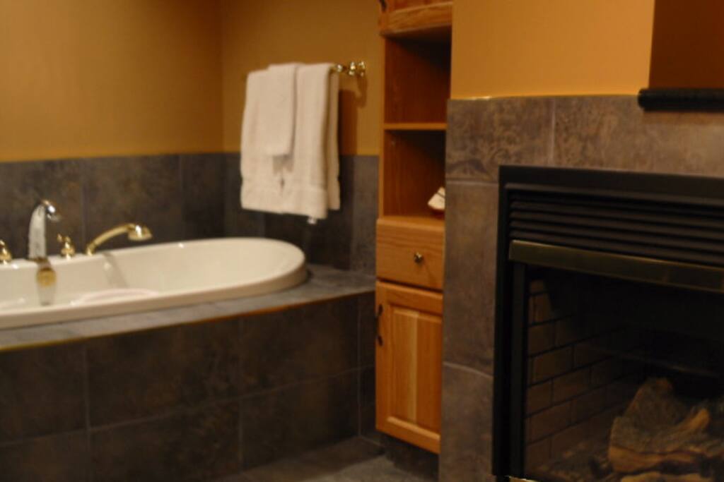 Step out of the jetted tub onto heated flooring.