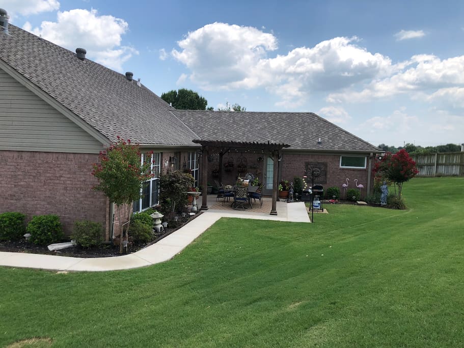 A short walk, illuminated by security lights, brings you to the patio of the home and the entrance of Marchbanks Haven.