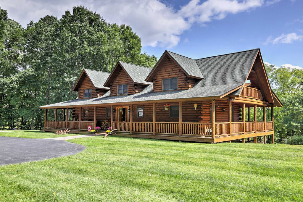 The house sits on 6 acres of lush property and is surrounded by a dense forest.