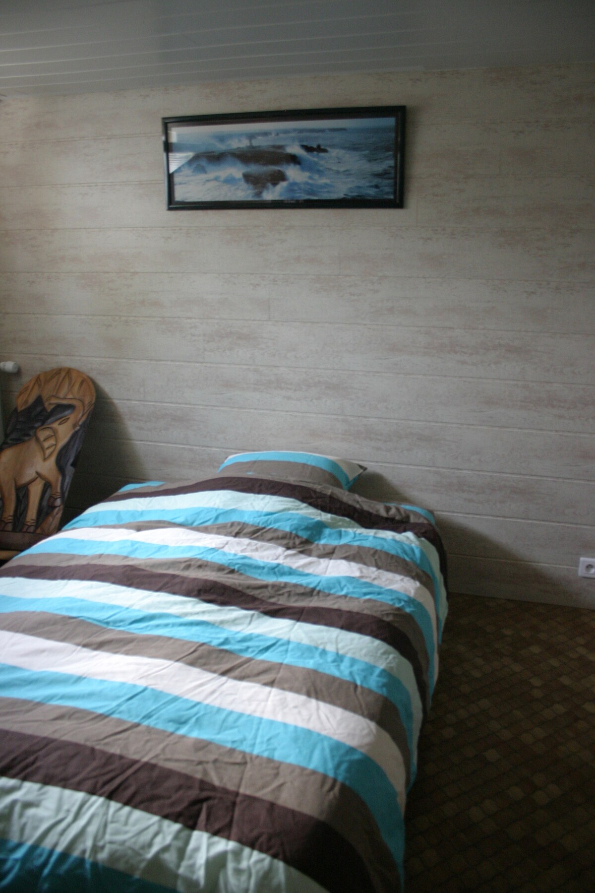 Sala de estar con clic-clac desplegado