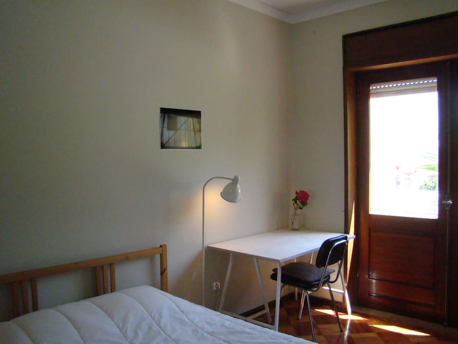 Room with double bed & balcony facing south