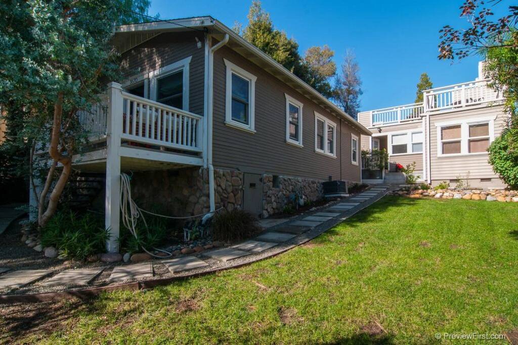 Side view of the house and the detached studio (also available to rent but is not included unless otherwise specified)
