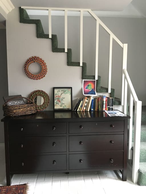Tons of storage, plus a peek up the stairs