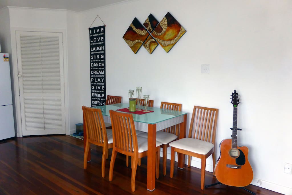 Dining table, plenty of room to spread out. An opportunity to all eat at the table.