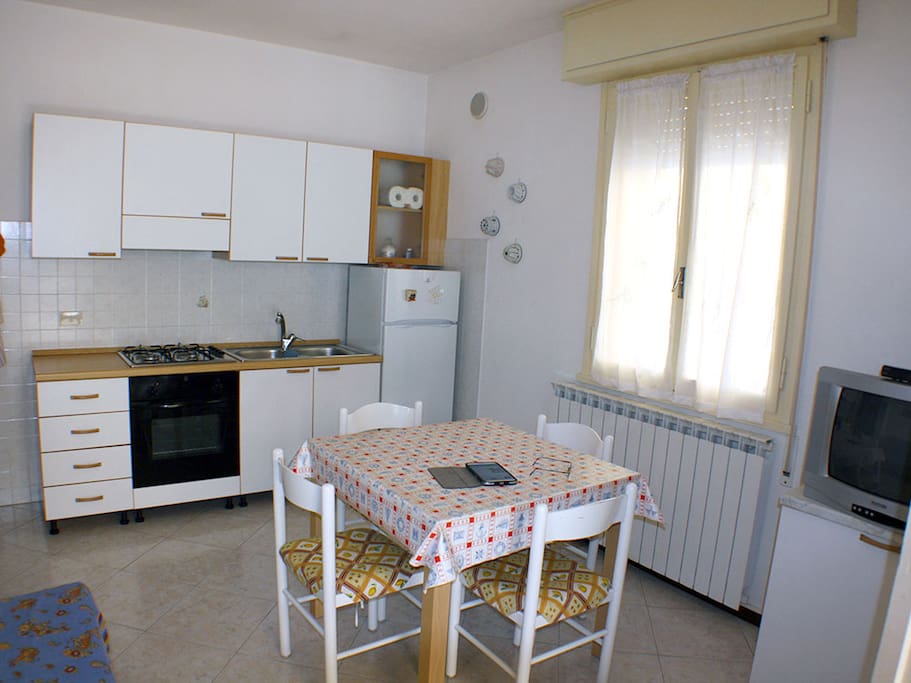 Soggiorno con cucina a vista