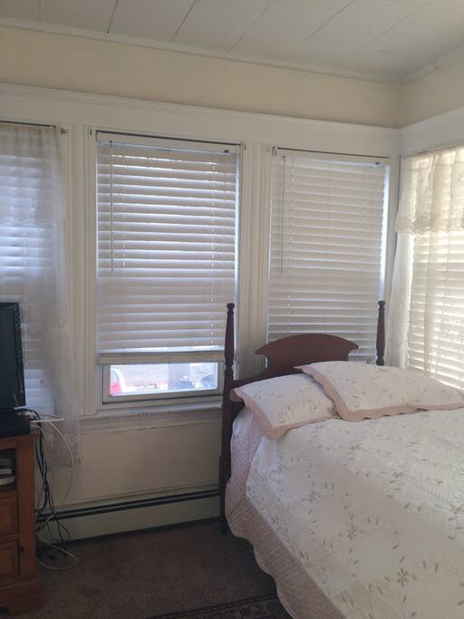 Large spacious private room with two single beds and chest and large walk in closet