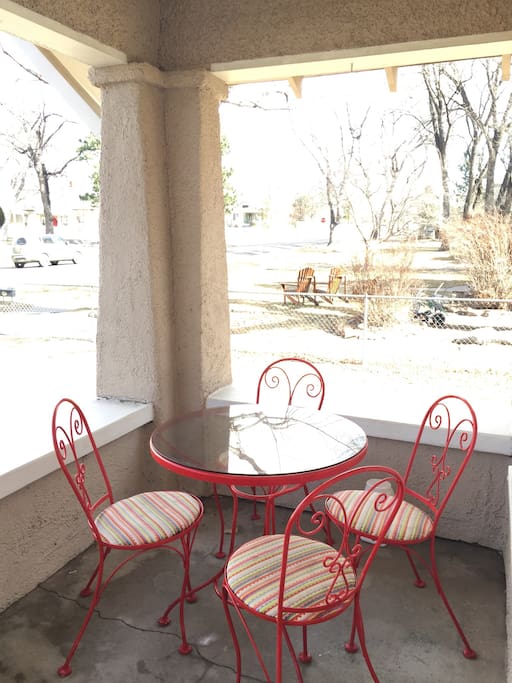 Outdoor seating for four on the front porch