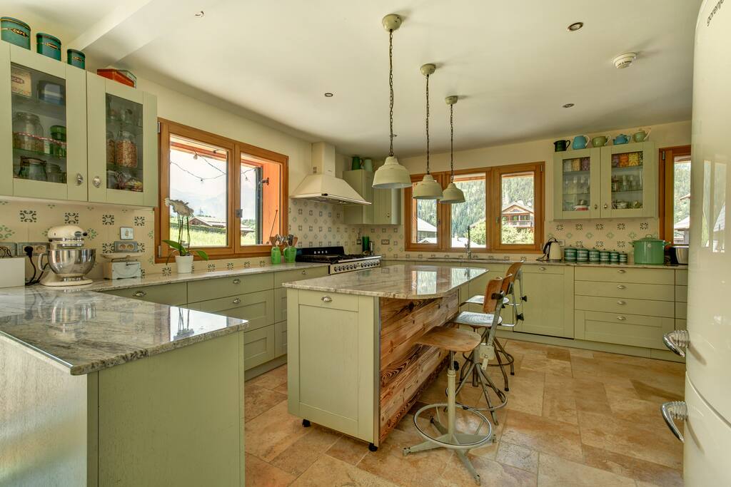 Large light kitchen, day sitting room and dining area on the ground floor