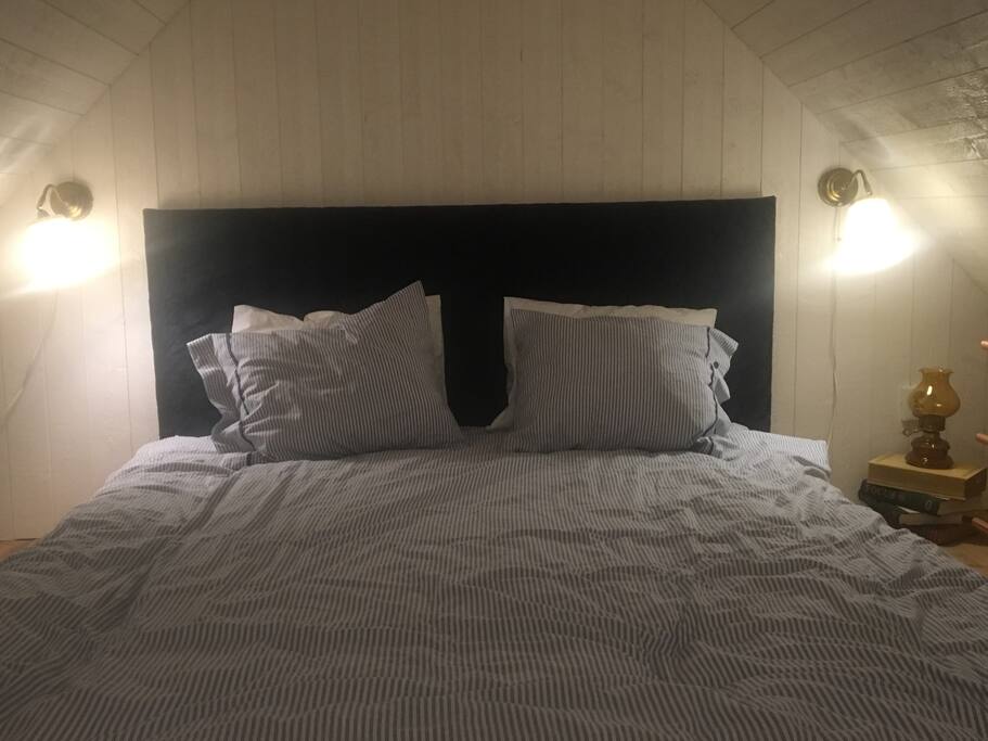 The cozy bed on the loft