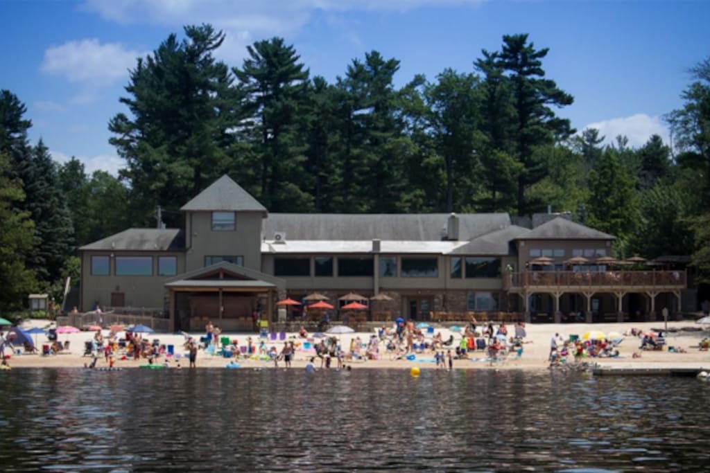 We are full members of LNC, a premier county club community, which gives you access to buy weekend or weekly guest passes at a reasonable rate. Without this membership, renters would not be able to access the many amenities here. This is a lake view of Clubhouse. Lots of entertainment and family fun! Outdoor bar and dining area.