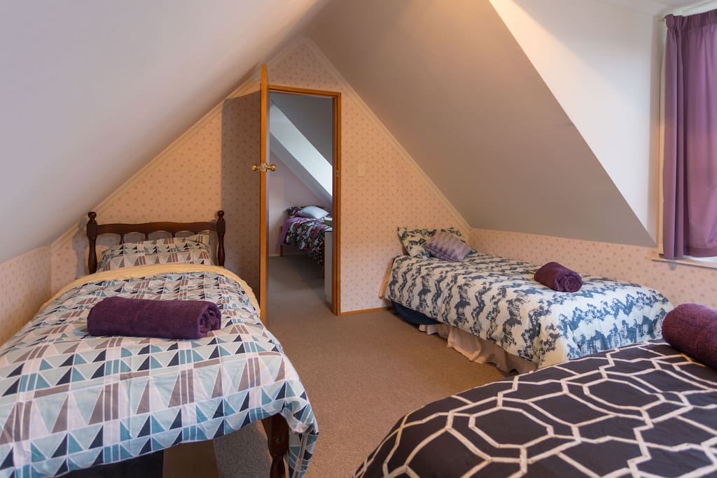 Two singles in the main bedroom.