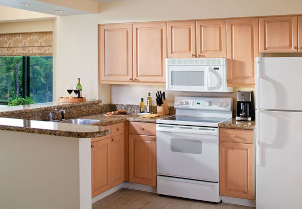 Convenient and fully-furnished kitchen.