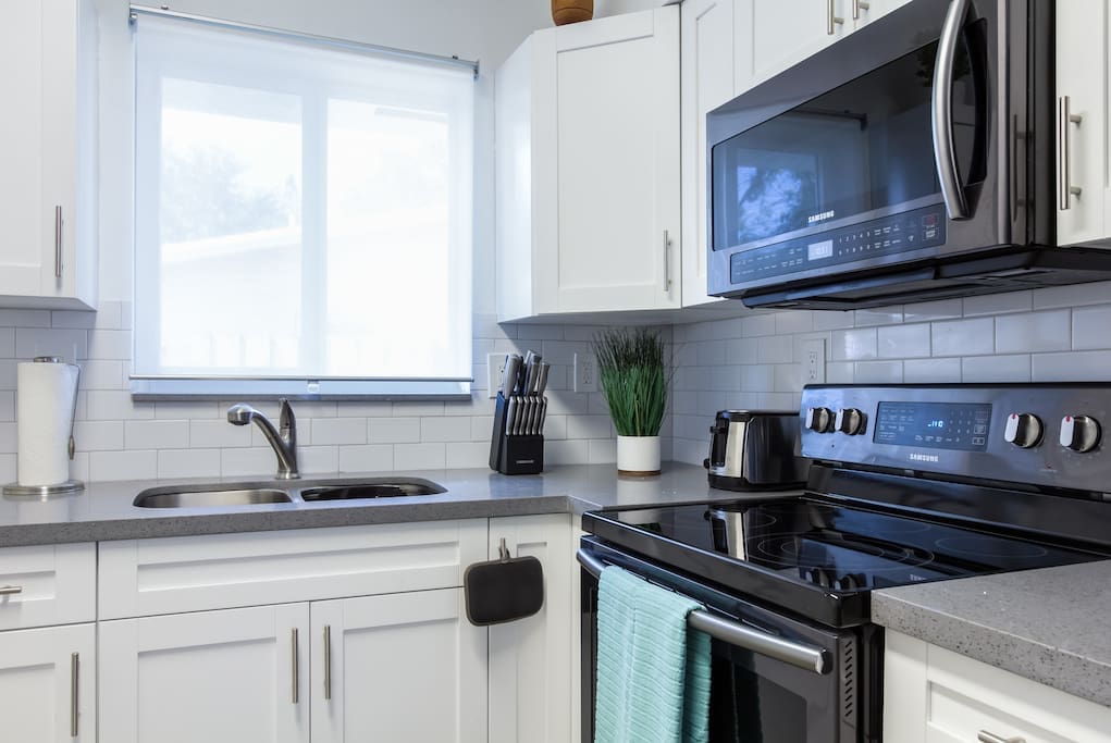 Kitchen fully stock with all your cooking and baking needs.