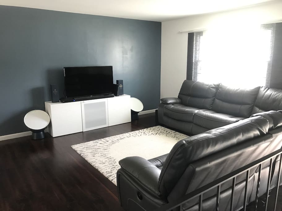 This is the living room with a smart tv and cable. Sound bar and bass sound great!