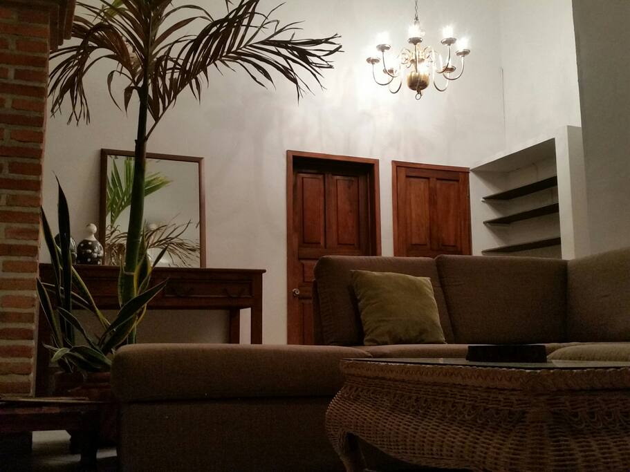 The livingroom conformed by a 6 people coach, decorative coffe table in the center.