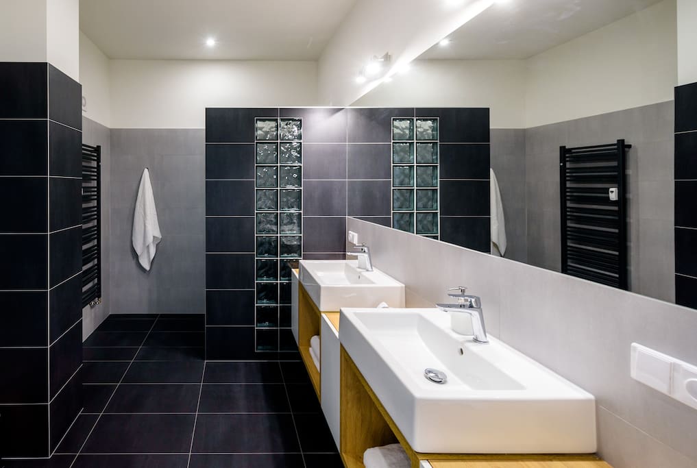 Luxuriously equipped bathroom with walk in shower will turn your showering ritual into a great experience.