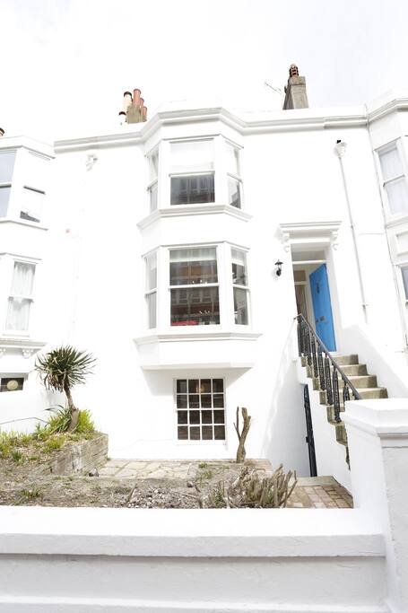 Access via flight of stairs to raised ground floor