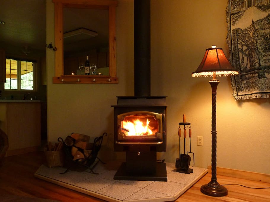 Hear the crackle and feel the glow of the wood fireplace while snuggled on the couch.