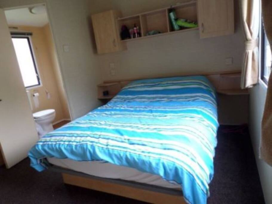 Large fitted wardrobes and en suite