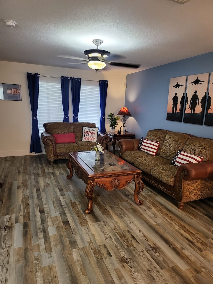 Living room space with 54" TV for entertainment