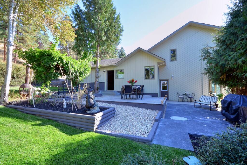 Side yard , dining , patio and lawn.