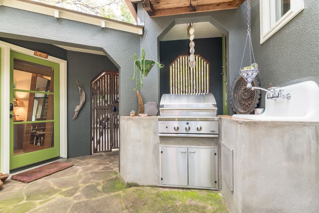 Step into the private grounds of the guest house with outdoor cooking.