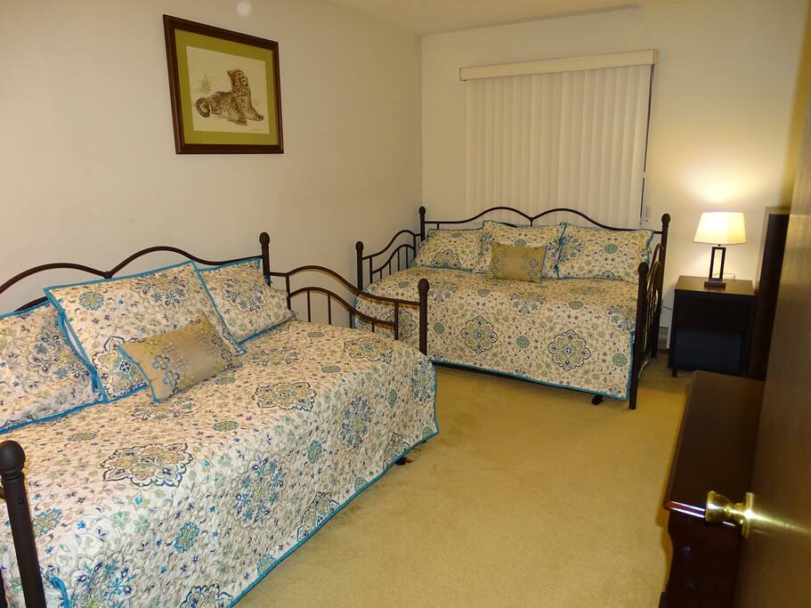 Bedroom 2 on lower level. Two daybeds with secondary mattresses that pull out from underneath. Sleeps 4.