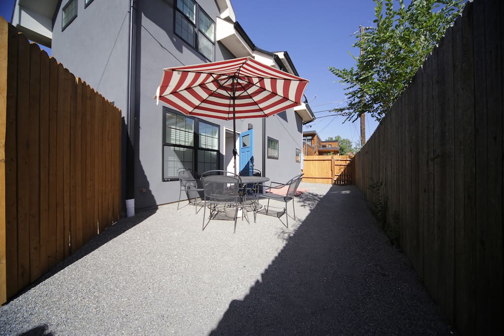 Private yard with sitting area and gas bbq grill