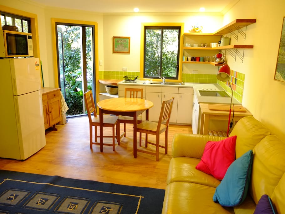 Lush garden, adding coolness and privacy, just outside kitchen