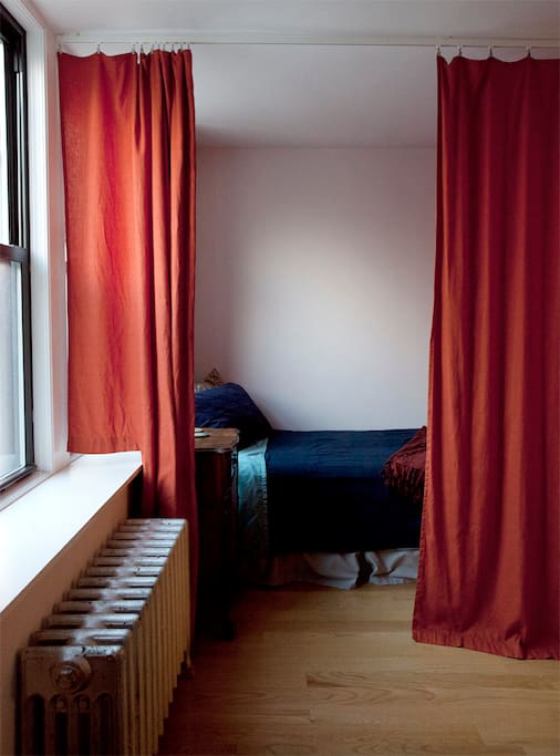 Two bright windows, but frosted glass for privacy,