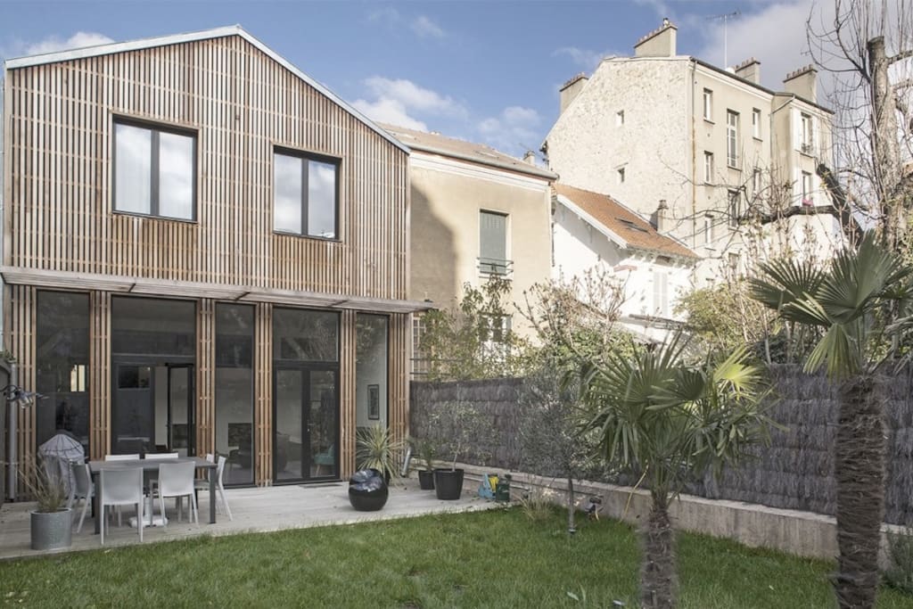 Une maison ouverte sur le jardin