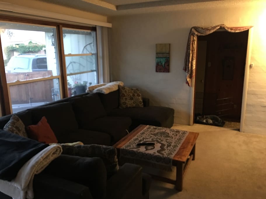 Very large windows in the private living room area.