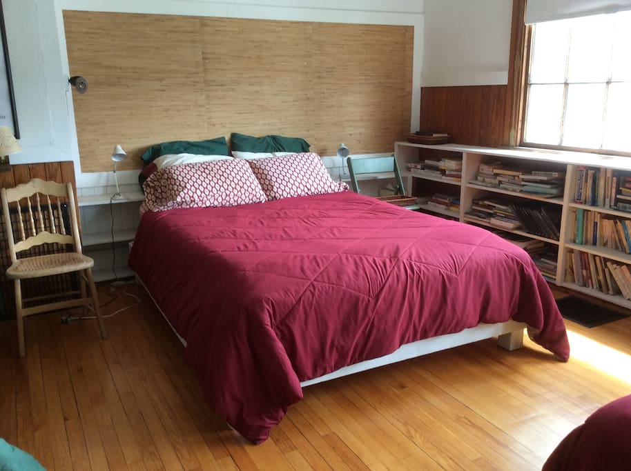 The Classroom has a Queen-size bed, 2 reading lamps and 100s of books. Cozy just for 2. Can be booked privately. $125 per couple or first 2 people.