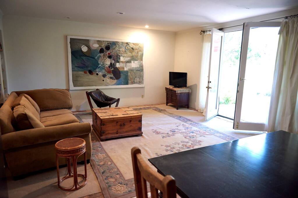 French doors open in to an outdoor patio with views